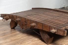 We are sharing the cutest farmhouse diy barn wood cart coffee table! Indian Rustic Antique Wooden Ox Cart With Metal Accents Made Into A Coffee Table For Sale At 1stdibs