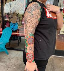 Tattoos are in near mint condition. Tattooers Jolly Roger Tattoo