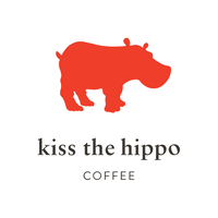 Huge hippo hand carved from mahogany wood with 'toughened' glass top. Kiss The Hippo Coffee Linkedin