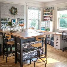 Natural light illuminates the space. Easy Craft Room Storage Ideas