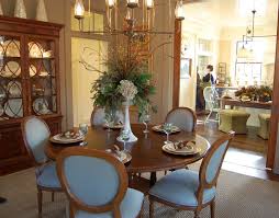 While deciding about decorating the house, we should never forego the designing of the dining area. White Vase Pretty Flowers Dining Room Table Centerpieces Decoration Ideas Beautiful Chic House N Decor