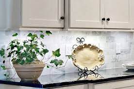 Choosing light rail molding that matches crown molding will unify the visual. Dress Cabinets For Success With Light Rail Molding