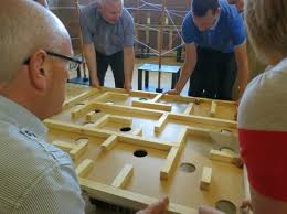 Outdoor team building activities have a decidedly different flavor than their indoor counterparts. Giant Puzzles For Corporate Team Building Aim For The Sky