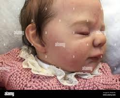 Realistic baby dolls hi-res stock photography and images