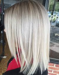 Medium length dark hair having curls breezing in the air makes for a cool hairstyle. 102 Of The Best Shoulder Length Haircuts For This Season