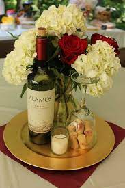 A collection of table decorations that capture the elegant sonoma wine country style, from al fresco dinner parties and fall tablescapes to thanksgiving and christmas tablescapes ideas. Wine Themed Centerpiece Wine Theme Wedding Wine Themed Wedding Centerpieces Bridal Shower Wine