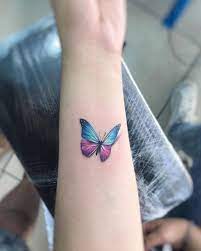 By Adrian Bascur Done At Nvmen Vina Del Mar Http Ttoo Co P 26229 Butterfly Tattoo Blue Butterfly Tattoo Tattoos