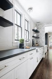 A brick backsplash is easy to install and isn't too expensive. P2304ufavtsvam
