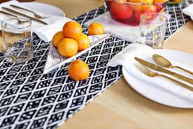 This white table skirt is a quick and easy way to add some classic, festive flair to your party. Diy Modern Table Runner A Beautiful Mess