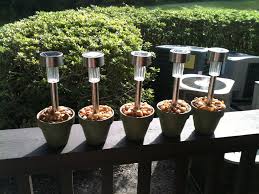 Solar Power Garden Lights On Sale At Target For One Dollar Spray Foamed Them In Seventy Five Cents Clay Pots That I Solar Patio Lights Solar Patio Solar Lights