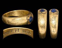 15c Gold Ring Set With A Sapphire Shoulders Engraved With A Madonna Child And A Priest Blesing The Hoop Medieval Jewelry Medieval Rings Renaissance Jewelry