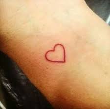 The body art is in red ink, and consists of a small line of script which has been underlined. 7 Best Red Heart Tattoos Ideas Red Heart Tattoos Tattoos Cute Tattoos