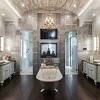 Large transitional master bathroom in melbourne with shaker cabinets, white cabinets, a freestanding tub, a curbless shower, gray tile, an undermount sink, grey floor, a hinged shower door, grey benchtops, a double vanity and a floating vanity. 3