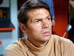 Gary Mitchell makes Captain Kirk's "headstone" which reads: "James R.  Kirk." In all other Trek references, his name is "James Tiberius Kirk".
