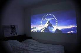 The nebula capsule projector combines portability with apps and a decent speaker to make a it helped this reviewer realize his dream of watching netflix on the ceiling while lying down in bed. Cute Date Night Idea Projector In Bedroom Diy Movie Projector My Room