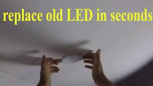 Once you have access to the bulb, grip the base and the wire and wiggle them apart. How To Replace Led Recessed Downlights Remove And Install Downlight Youtube