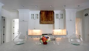 Here's how to choose the building a custom wood mantel allows you to recess a hood insert above the stove, making it nearly invisible. Wood Range Hoods Naturally Fit Kitchen Style