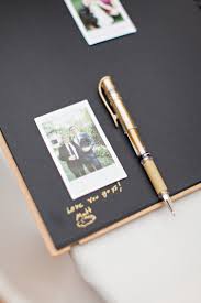 The wedding guest book may not be one of your big day priorities but it will hold everlasting memories of your day. Fujimax Instax Photo Wedding Guestbook Handmade And Homegrown