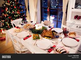 So, play christmas party games; Christmas Meal Laid On Image Photo Free Trial Bigstock