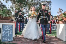 A photo of Marine Sgt. Taylor Ziegel and his wife on their wedding day. He  suffered severe deformation during the Iraq war. The couple divorced a year  later. War and all wars
