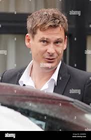 Le chanteur bleu Lee Ryan arrive au tribunal de justice d'Ealing à Londres,  accusé d'abus et d'agression d'un membre de l'équipage à bord d'un vol  British Airways et d'agression d'un policier à