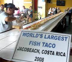 Costa rica fishing here you have variety of fish that are able to capture the years thanks to the beautiful warm waters of costa rica. World S Largest Fish Taco Jaco Beach Costa Rica The Taco Tamer