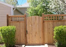 An aged rustic traditional split rail fence marking the boundary of this cabin on a heavily wooded lot. Gates Craftsman Landscape Denver By Split Rail Fence Co Denver Co Houzz