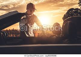 We did not find results for: Caucasian Driver In His 40s And Convertible Car Summer Road Trip Scenic Countryside Sunset Transportation And Automotive Canstock