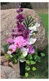 Many silk flower web sites claim their cemetery flowers will last with continuous outdoor exposure. 500 Cemetery Memorials Ideas In 2021 Cemetery Flowers Memorial Flowers Grave Flowers