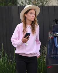 Newly released snaps of the photogenic couple show them soaking up the sun on a yacht off the island of giglio near tuscany last week. Olivia Wilde Wears Harry Styles Necklace From The Golden Video After She Moves In With Him
