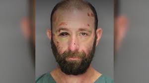 Man arrested after assaulting officer, hotel guests in Acworth