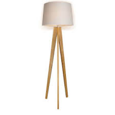This ames drum floor lamp with storage shelf features two shelves with a distressed iron finish and a durable white ames shade; Poppy Tripod Floor Lamp Natural Homebase