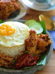 It is also the native dish in neighbouring areas with significant malay populations such as singapore, brunei. Nasi Lemak Dan Ayam Goreng Rempah Dapur Tanpa Sempadan