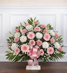 While white is the most common colour for sympathy flowers because of it's association with goodness and purity it isn't essential. Pink And White Heartfelt Floor Basket In Hampton Falls Nh Flowers By Marianne