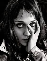 fiona apple... and her new fringe! she has turned into a bit of a hero for  me. her music defies gravity. no, that makes no sense, but i mean it!