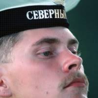 U.S. Navy Boatswain's Mate 1st Class Dmitry Spiridonov issues orders