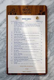 Spicy crab, cucumber, cilantro on top with salmon, tuna. Brass Onion Menu By Carpenter Collective I Am Professional To Design Complex B In 2021 Cafe Menu Design Menu Book Menu Restaurant