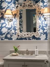 Wallpapers are used in different areas of the house even in the bathroom. Elegant Transitional Powder Room With White Shiplap And Bold Navy Wallpaper Hgtv