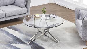 The oak wood legs add warmth, and the clear tempered glass top is perfect for making the most of even the smallest spaces. Finn Round Tempered Glass Coffee Table Las Vegas Furniture Store Modern Home Furniture Cornerstone Furniture