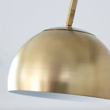Up top, a fabric drum shade ensconces one 60 w incandescent e26 this metal floor lamp combines the cozy elements of a fabric rectangular shade for a clean but modern aesthetic. Overarching Metal Shade Floor Lamp