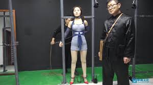 BoundHub - Chinese woman metal bondage
