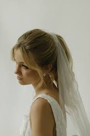 Playful Ponytails Styling The Classic Wedding Ponytail Tania Maras Bespoke Wedding Head Wedding Ponytail Wedding Hairstyles For Long Hair Bridal Ponytail