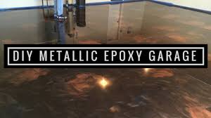 I love the way the epoxy looks, but there are minor imperfections, such as trapped lint and small bubbles, that keep the surface from looking like a perfect sheet of glass. How To Install Amazing Metallic Epoxy Floor Coffee Brass And Black Youtube