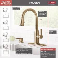 It's got good clearance for a lot of water bottles and cookware that might be used in a camper. Delta Marca Single Handle Pull Down Sprayer Kitchen Faucet With Shieldspray Technology In Champagne Bronze 19780z Czsd Dst The Home Depot In 2021 Faucet Kitchen Faucet Delta Kitchen Faucet