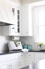 Installing a mother of pearl backsplash is simple even if it is your first time tiling a backsplash! How To Install A Mother Of Pearl Tile Backsplash