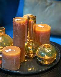 Gorgeous candle holders that enhance your space. Candle Rustic Amber Candles And Candle Holders Buy Candles Online Flowerfeldt