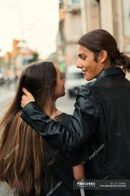 Slick your hair back with some product if you have straight hair. Back View Of Couple Walking On Street Together And Looking Each One Vertical Long Hair Stock Photo 171157854