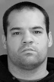 Four charged in 'drug related' invasion of home