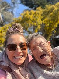 From childhood bed to Swiss bench… same smile, same soul." 📸 Then & Now  #StillMe #TimelessJoy