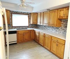 The corner drawers will be divided into these cabinets can be paneled to blend in with the other kitchen cabinets. L Shaped Kitchen Cabinet Design Layout Novocom Top